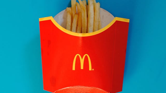 Logo for news article #1 (McDonald's FLASHES warning signs about the state of the consumer)