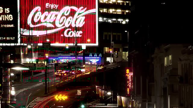 Logo for news article #2 (Coca-Cola Gains in 3 Months: Momentum Play or Overpriced Refreshment?)