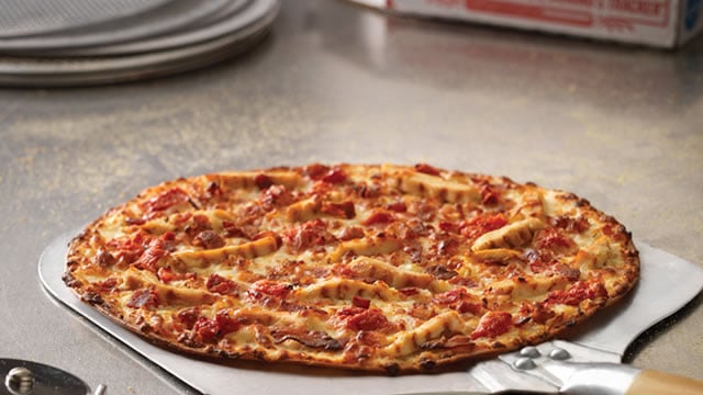 Logo for news article #1 (Here's Why Domino's Pizza (DPZ) is a Strong Growth Stock)