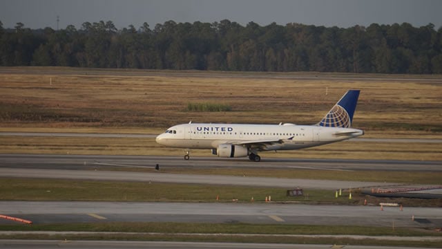Logo for news article #1 (United Airlines Tech Issue Grounds Hundreds of Flights. The Stock Shrugs.)