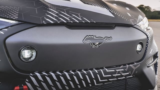 Logo for news article #1 (Will U.S. Tariffs and Emission Policies Boost Ford's Edge?)