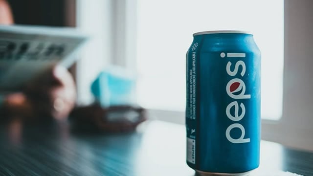 Logo for news article #1 (Pricing Power vs. Volume Pressure: What's Driving PepsiCo Now?)