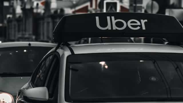 Logo for news article #2 (Billionaire Bill Ackman Is Buying Uber Stock. Should You?)