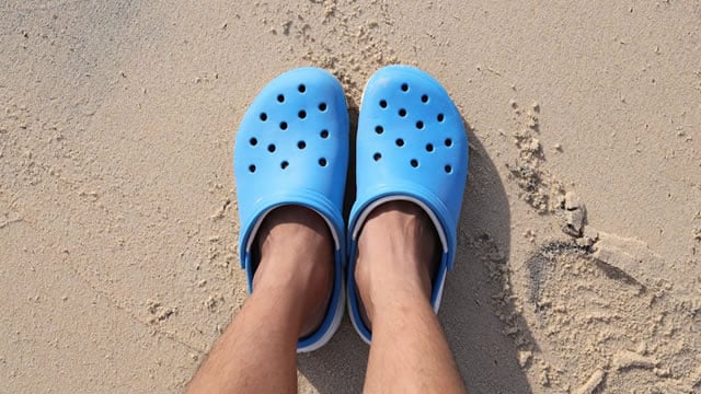 Logo for news article #2 (‘Almost everybody' in the U.S. has a pair of clogs. BofA analysts say there's still a lot to like about Crocs.)