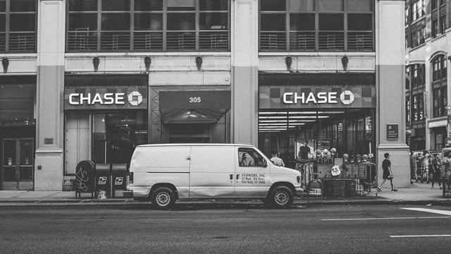 Logo for news article #1 (JPMorgan Chase Reorganizes Private Bank to Facilitate Global Investments)