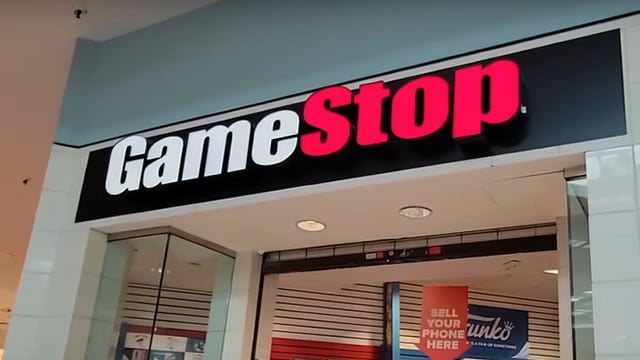 Logo for news article #1 (GameStop (GME) Stock Dips While Market Gains: Key Facts)