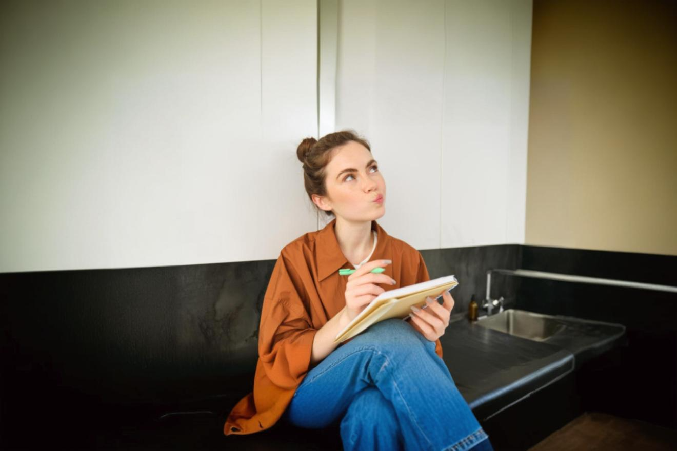 Young woman using the Emma app to plan her future.